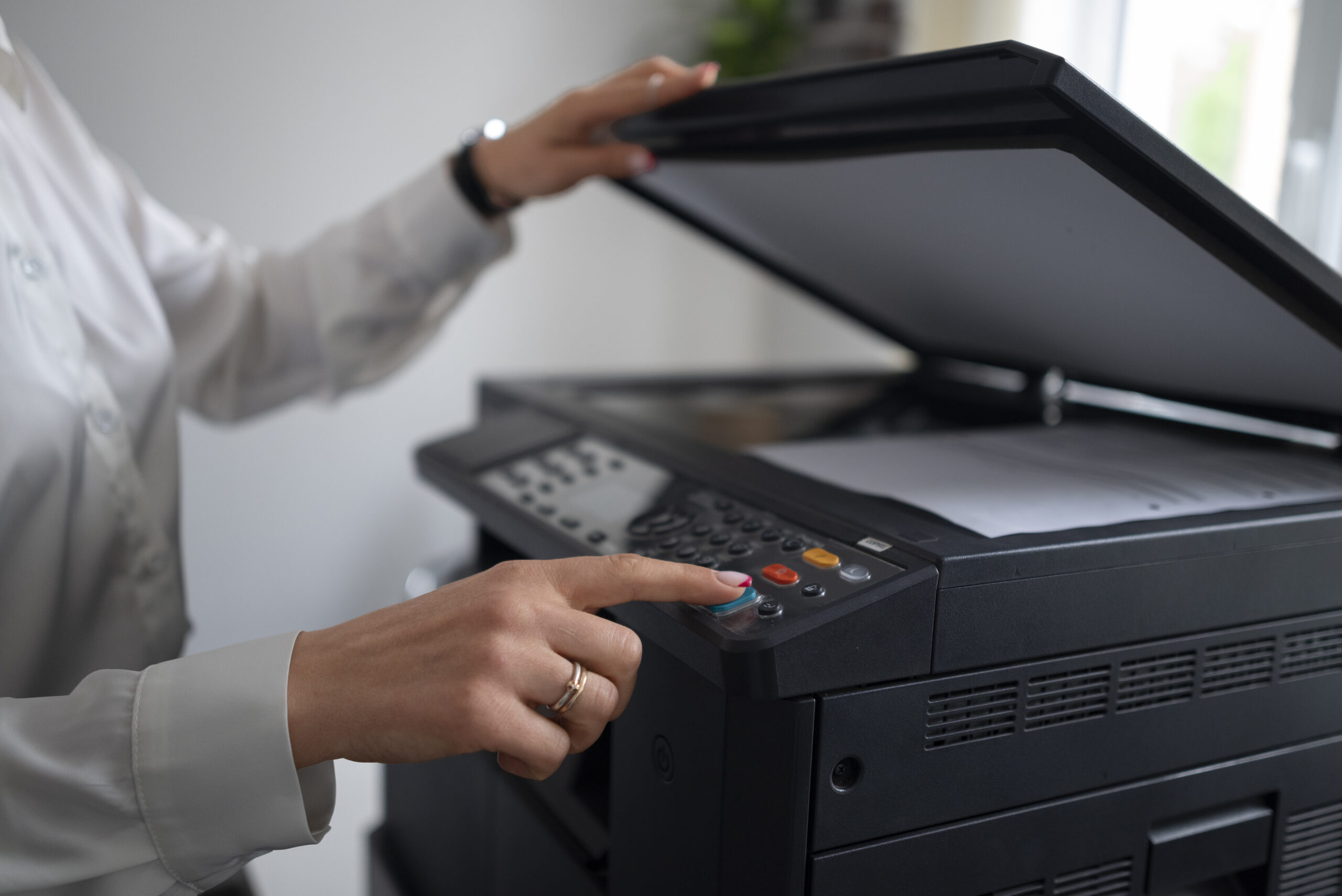 woman-work-office-using-printer